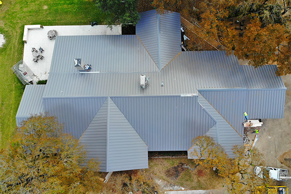 aerial top view of residential property with metal roof installed salado tx
